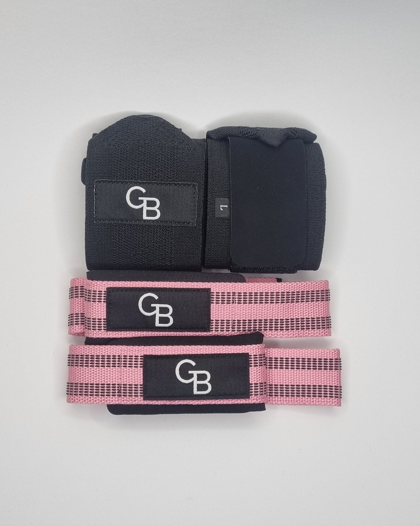 Black and pink GB straps on a white background