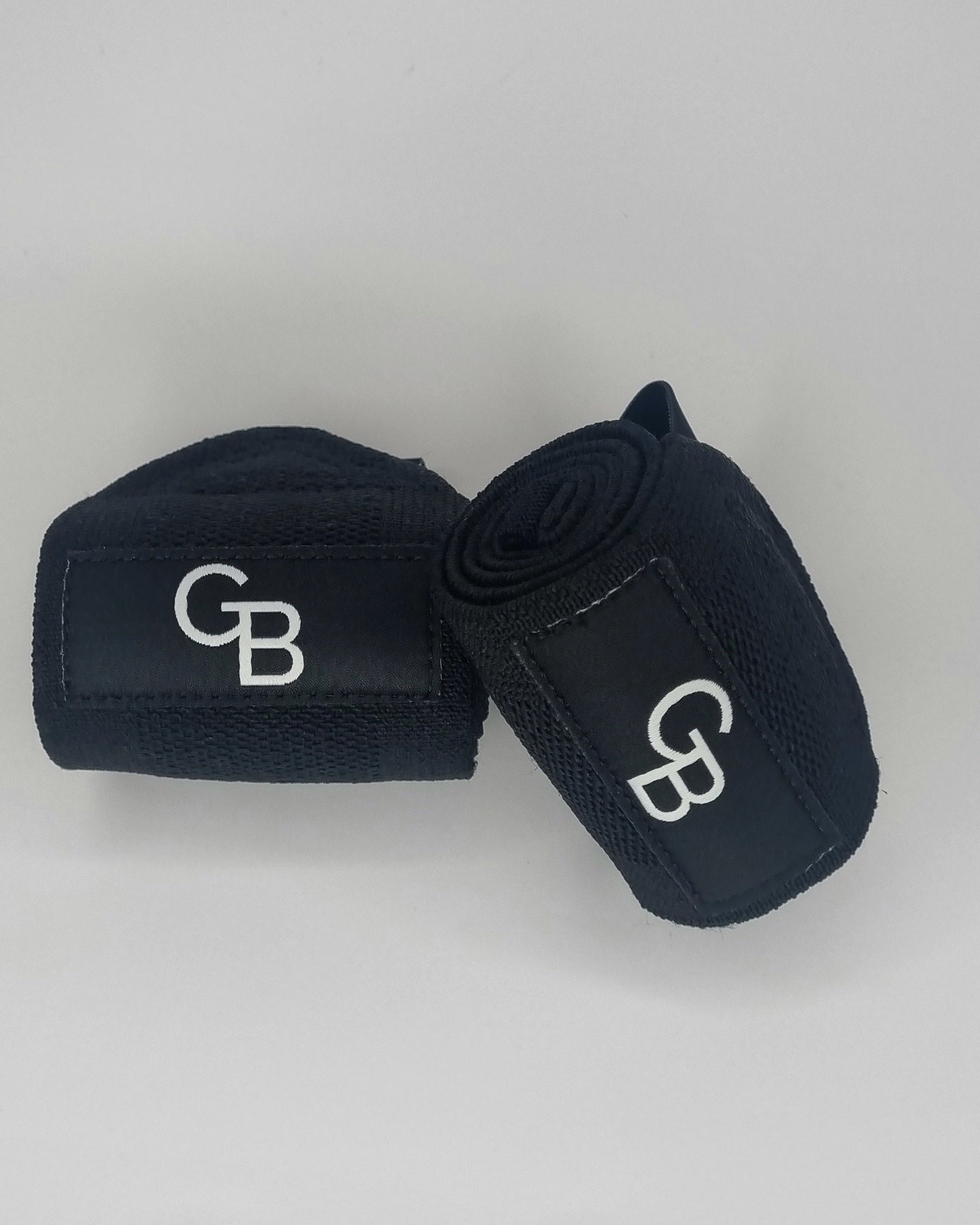 Wrist wraps for strength training and powerlifting, front view with logo