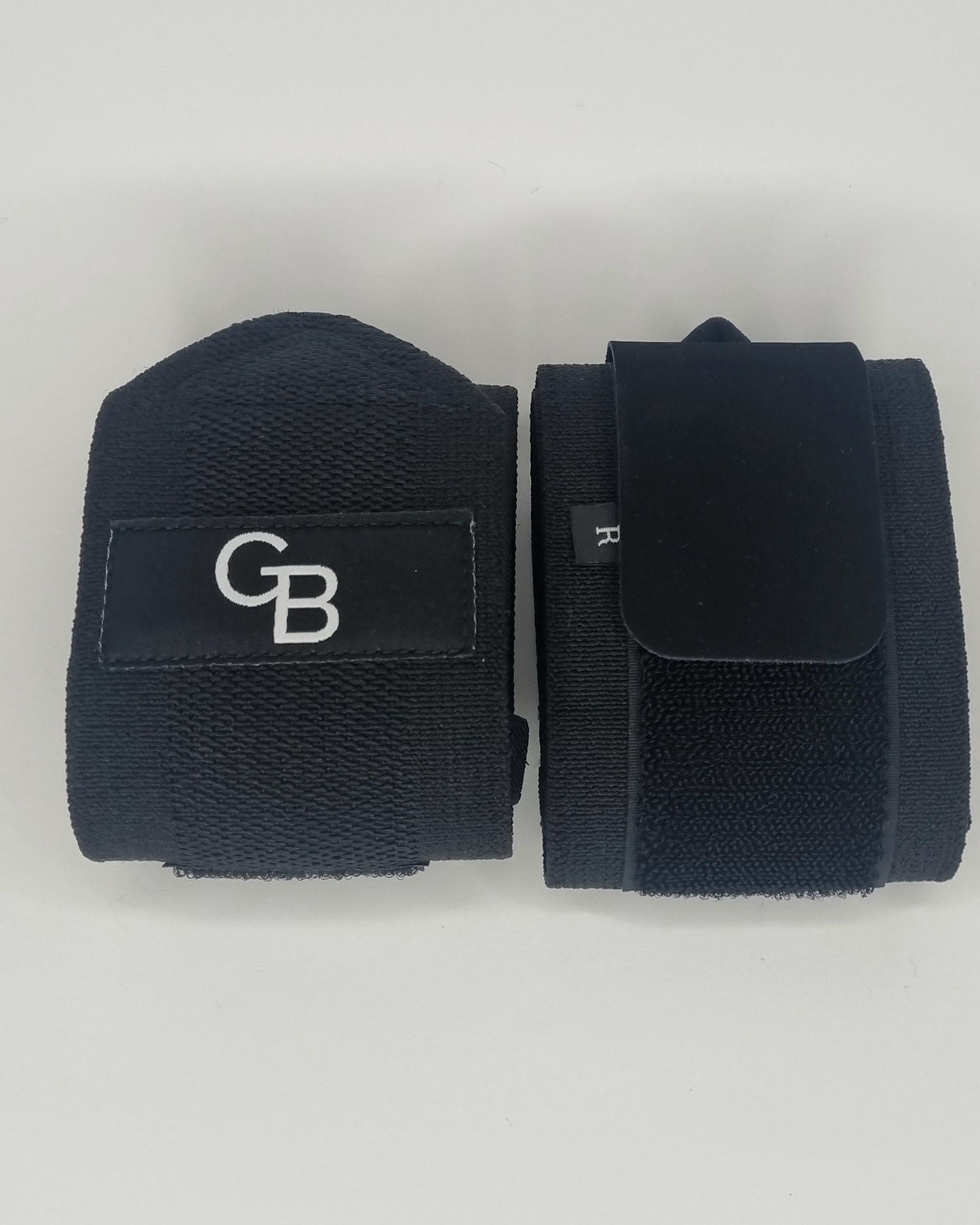 Wrist wraps for strength training and powerlifting, front view with logo and velcro view